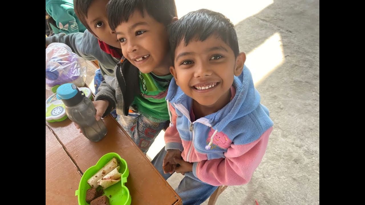 Mathieson Music school Kolkata India Reception class receiving their first violins