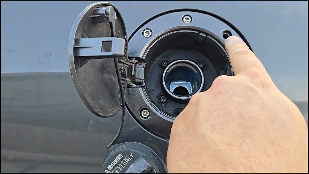 2001-2008 HYUNDAI TIBURON fuel door removal