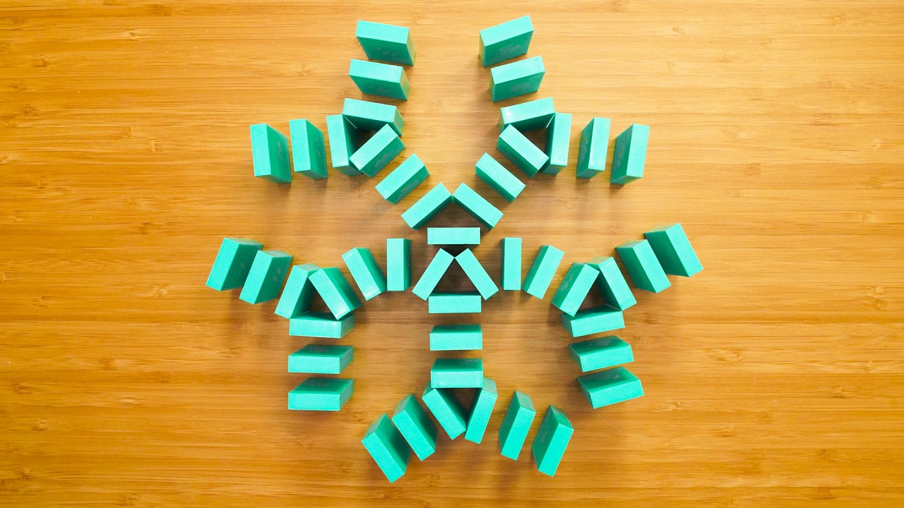 How to Build a Snowflake in Dominoes