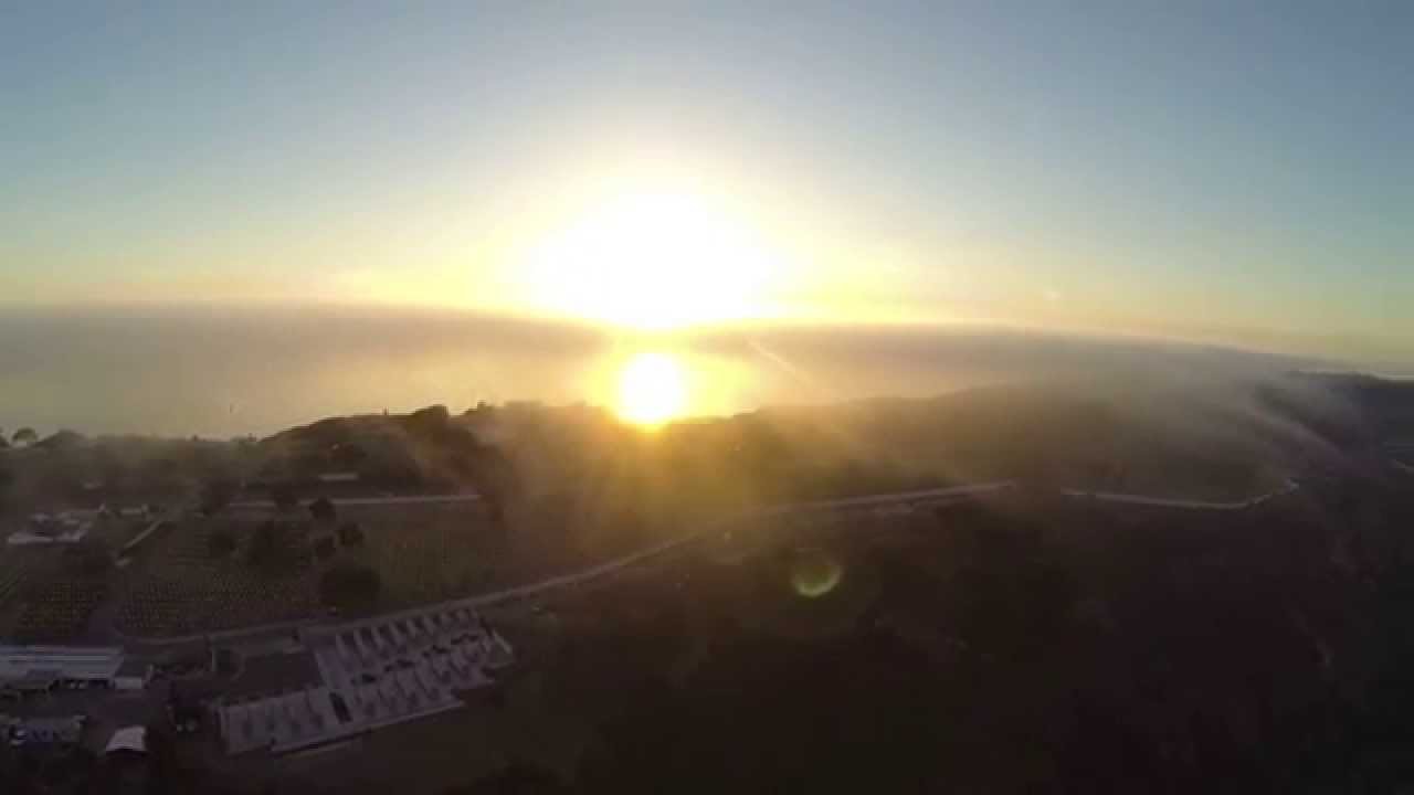 Aerial video of Fort Rosecrans National Cemetery with fog rolling in