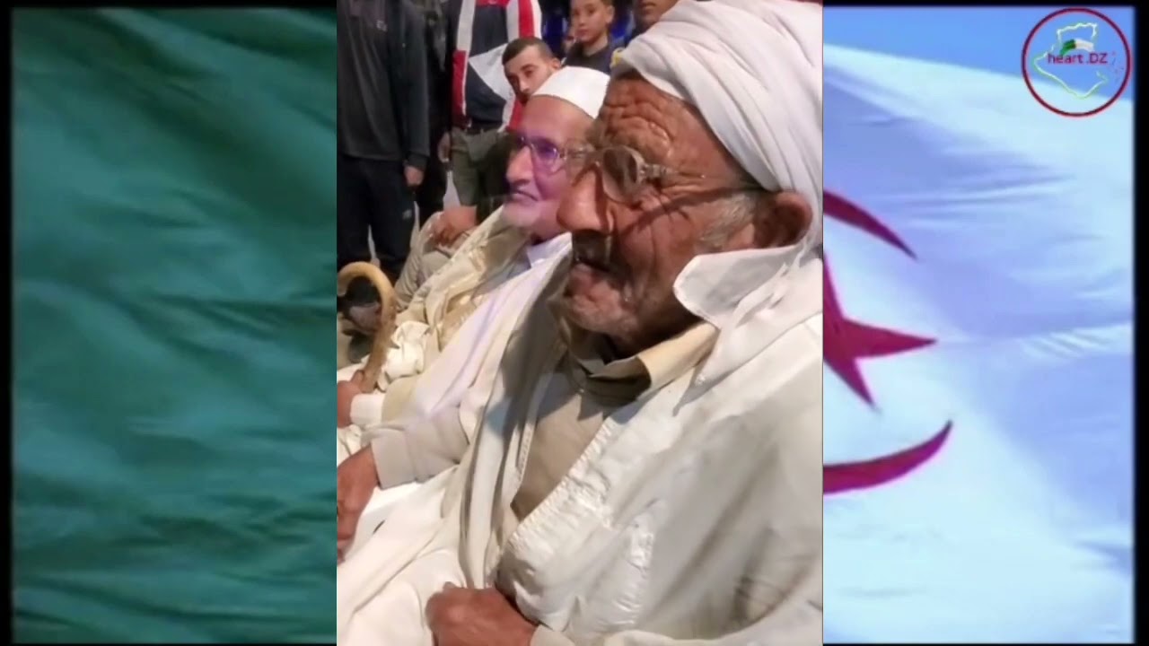 اللي ماتأثرش مش جزائري / مجاهد كبير يذرف الدموع عند سماعه لأغنية ثورية  جينا من عين مليلة 🇩🇿