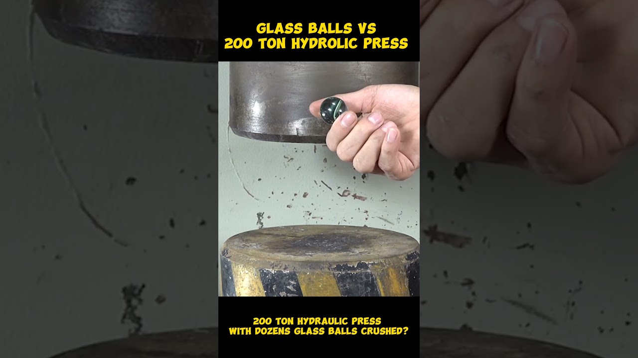 Glass balls Vs 200 ton Hydraulic press
