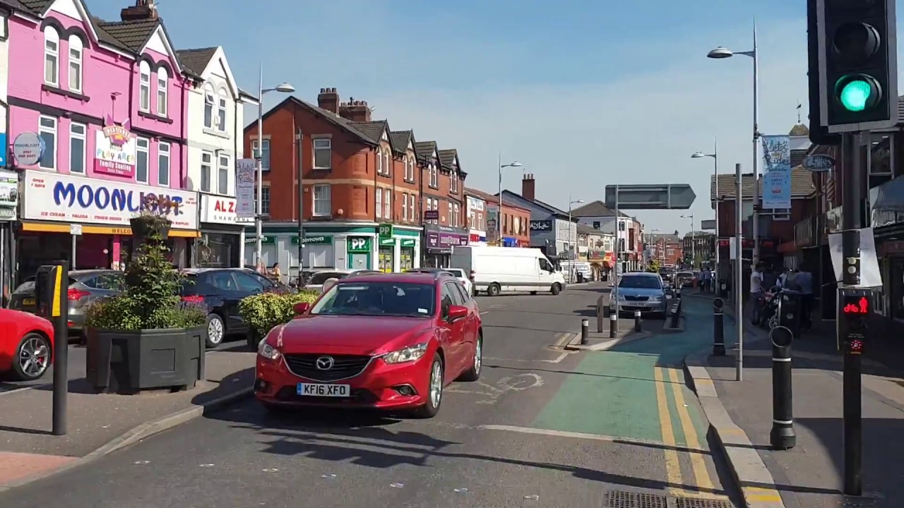 Traveling Through Rusholme Manchester