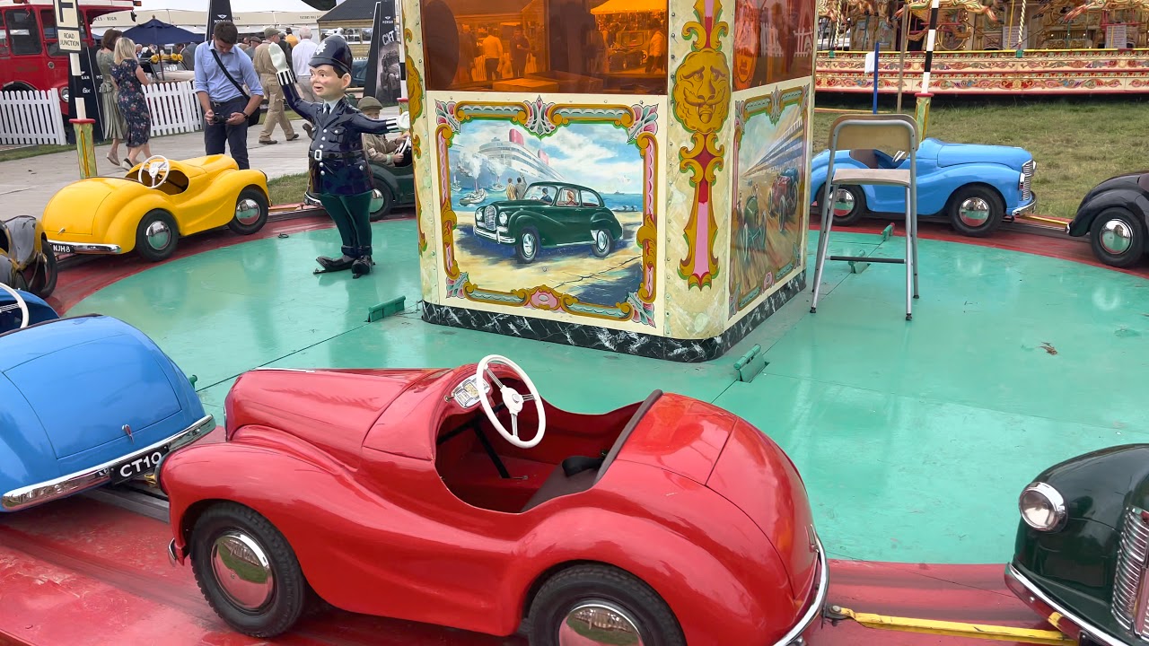 Austin J40 pedal car fairground ride at Goodwood Revival 2021