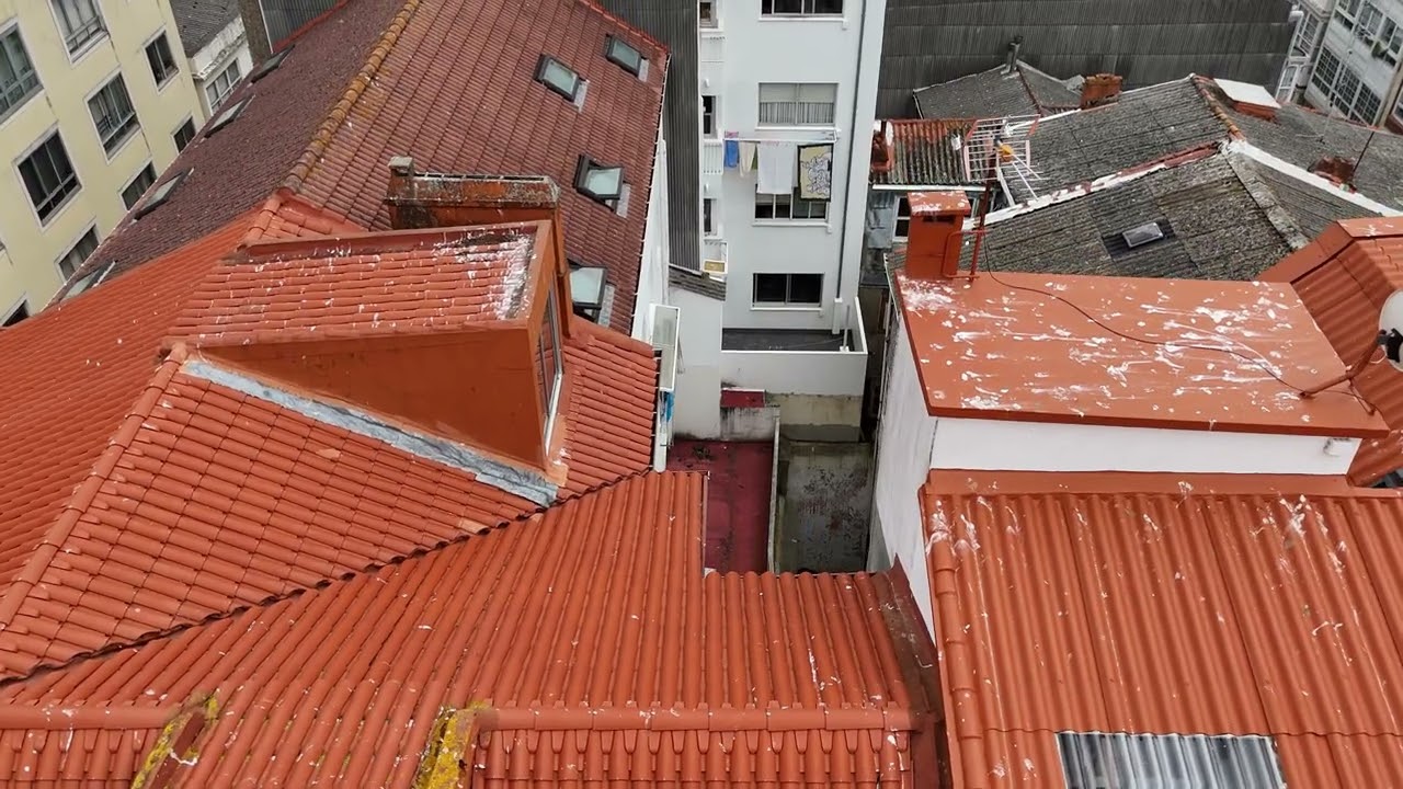 Fachadas y cubierta de una casa de Ferrol