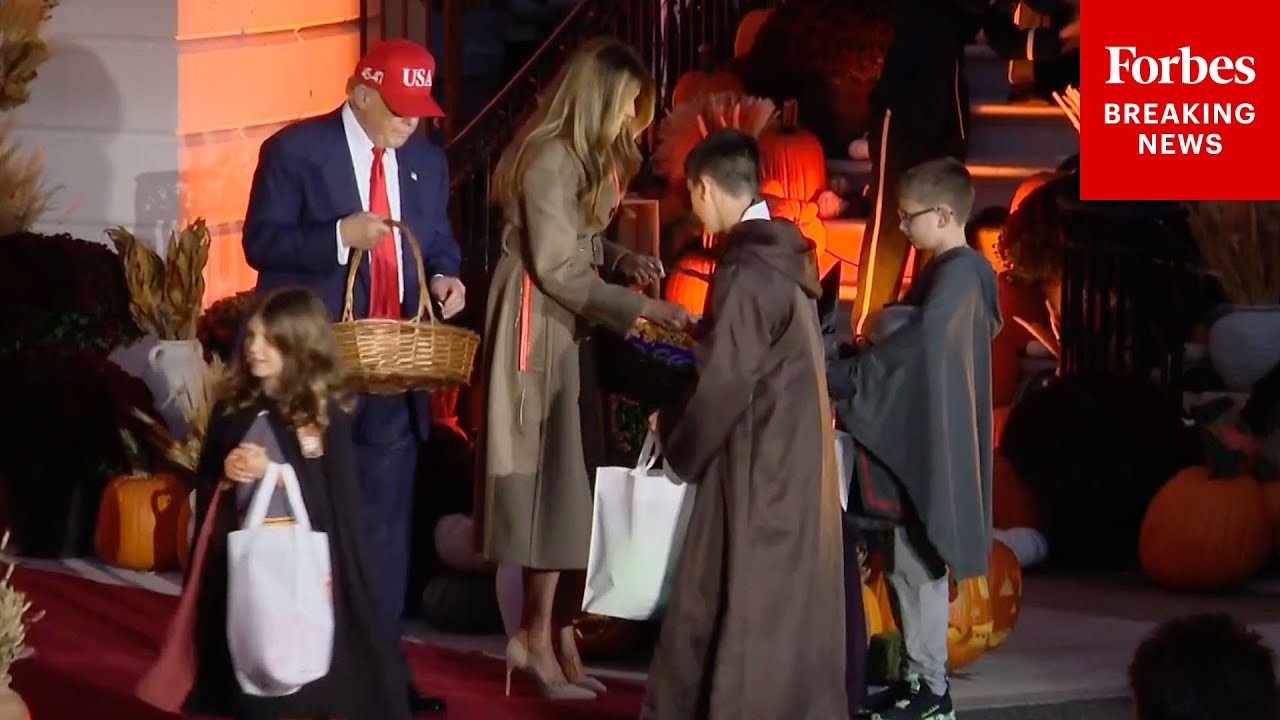 President Trump And First Lady Melania Trump Pass Out Candy To Kids At White House Halloween Event