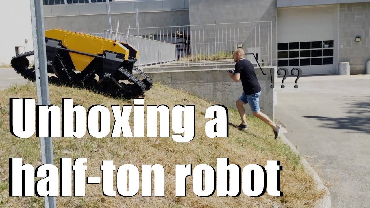 Unboxing a half-ton robot