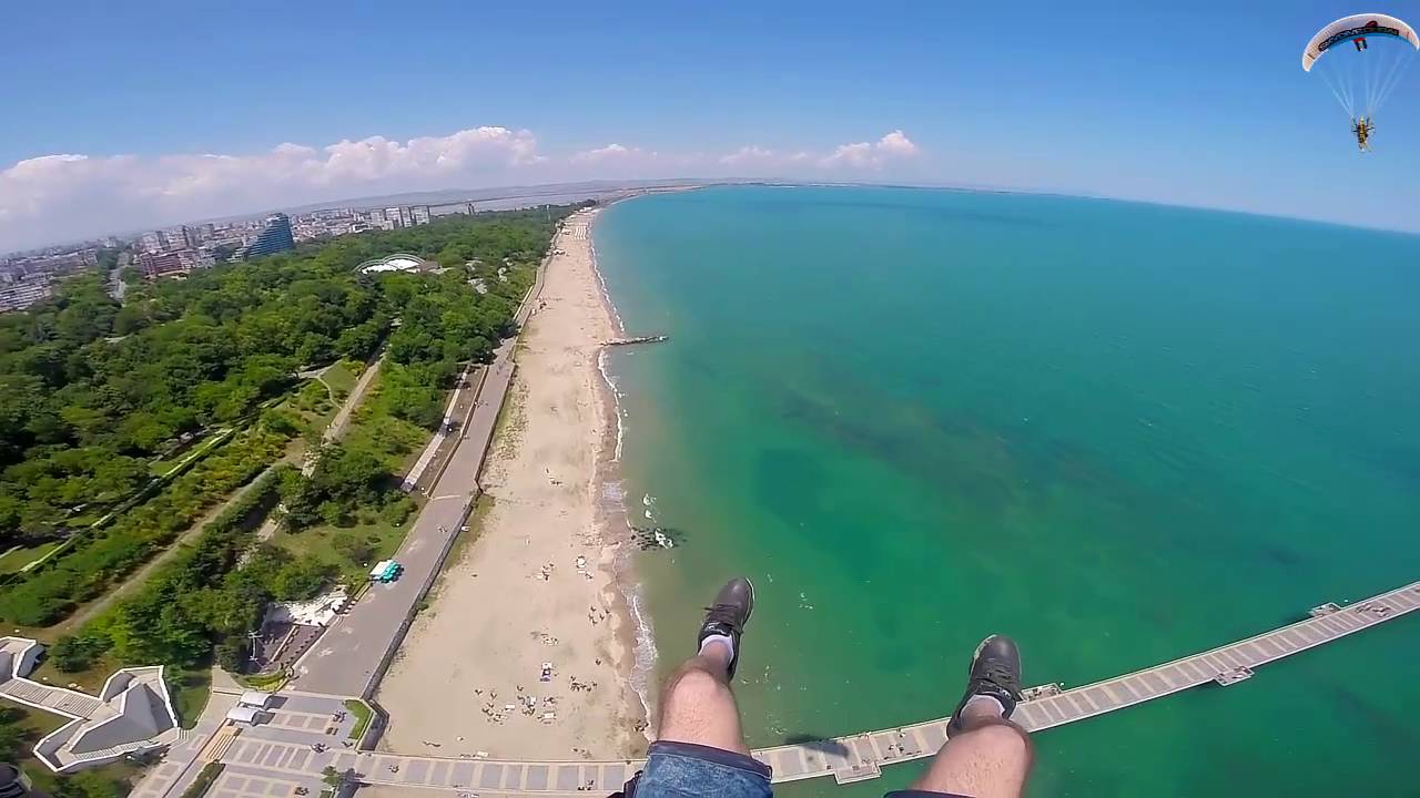 paramotor fly in beach, take off and landing