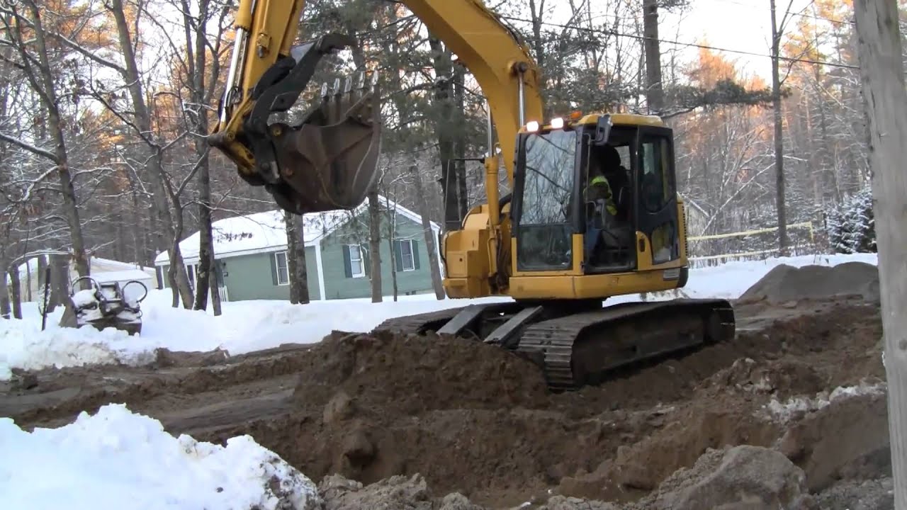 Komatsu PC138US and Deere 200CLC Working