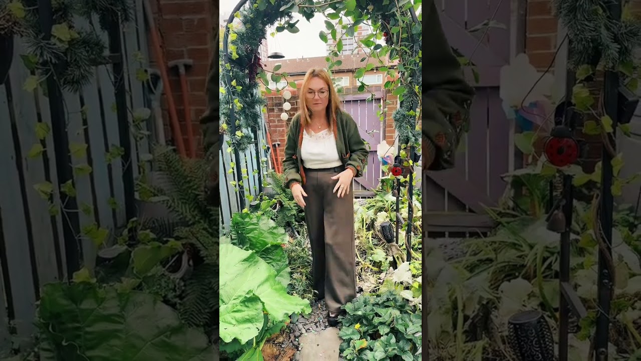 Perfect — those olive-green wide-leg trousers are such a midlife soft-life staple