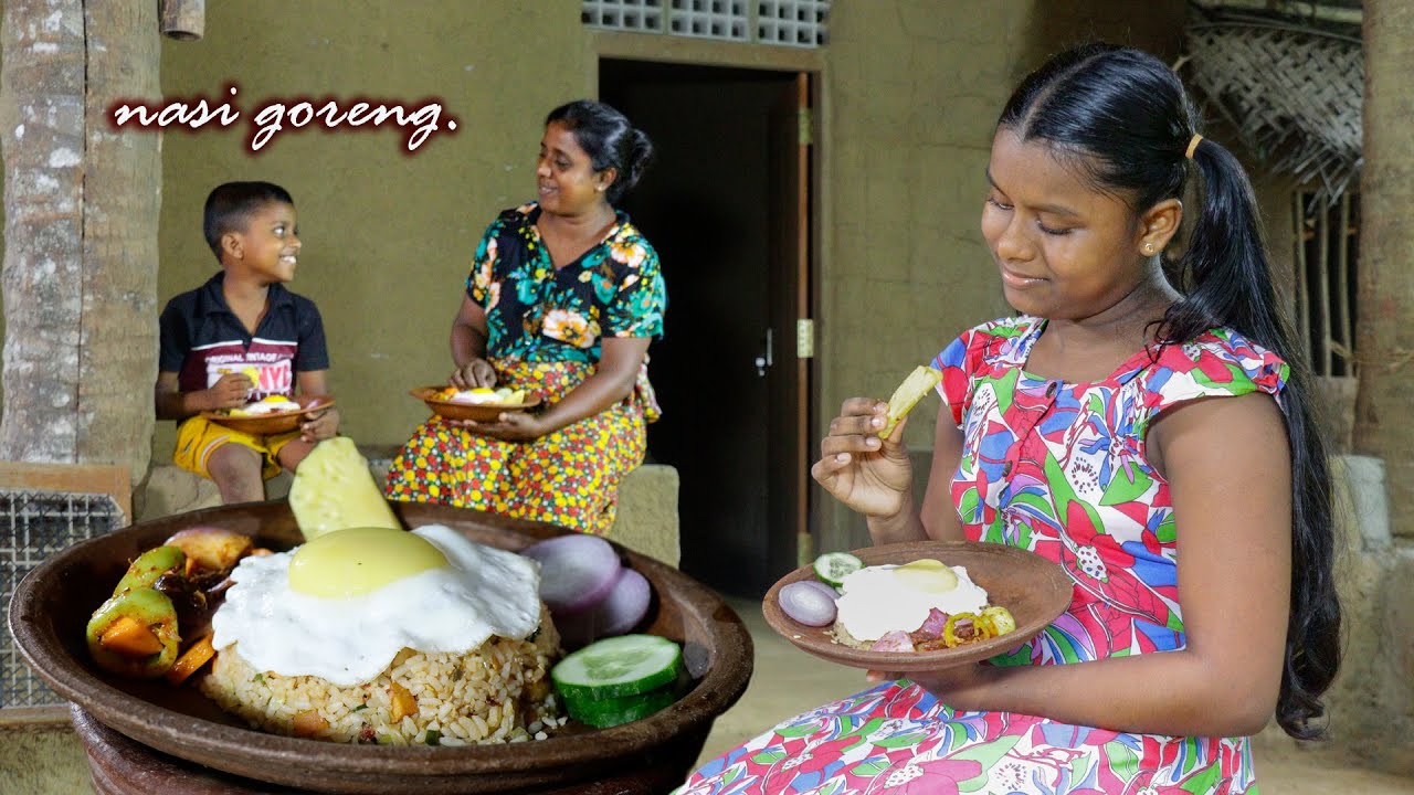 nasi goreng .A very easy homemade nasi goreng is a delicious lunch.  ..village kitchen recipe