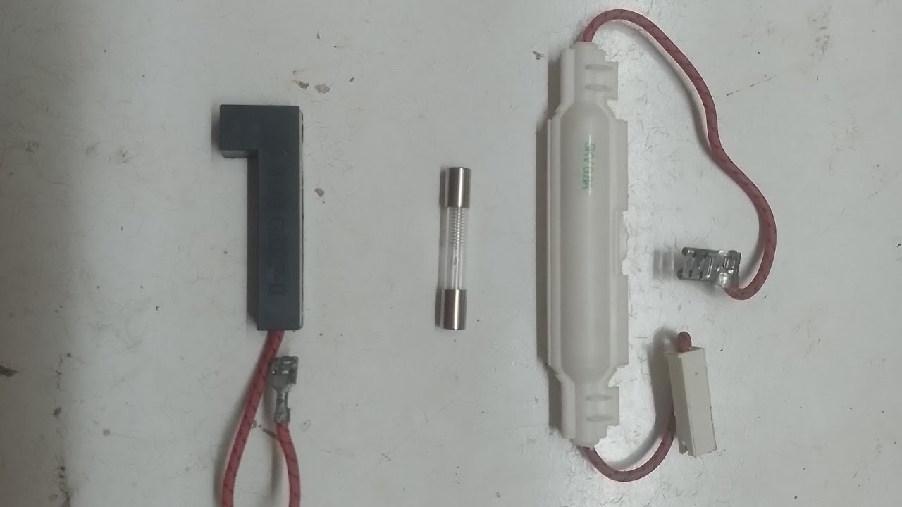 FUSIVEL  DE ALTA TENSAO DO  MICROONDAS  QUAL O LADO CERTO  DE LIGAR E PRA QUER SERVE A MOLA 