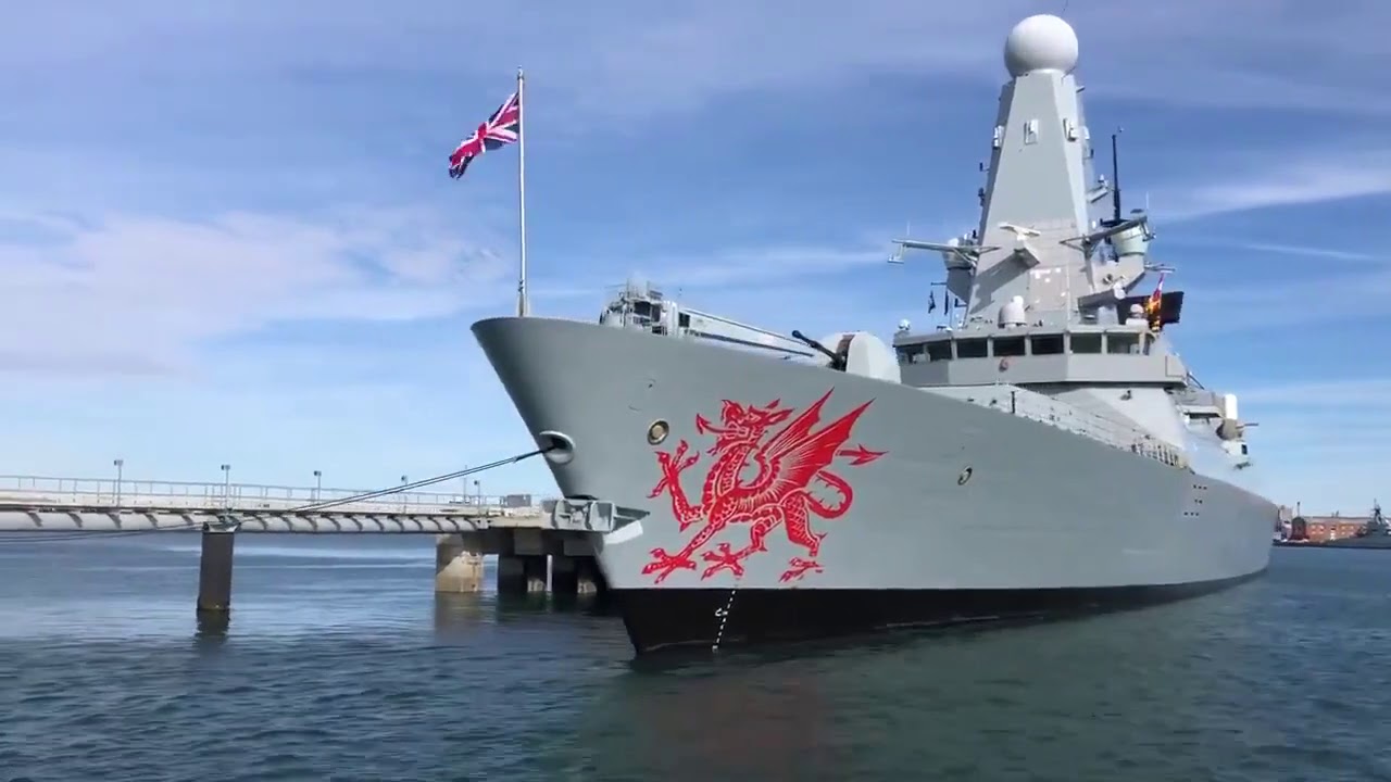 HMS Dragon embarking munitions at the UHAF in Portsmouth