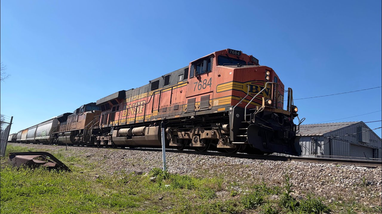 BNSF 7684 leading an Eastbound BNSF Manifest train through Central Avenue in New Orleans Louisiana. 