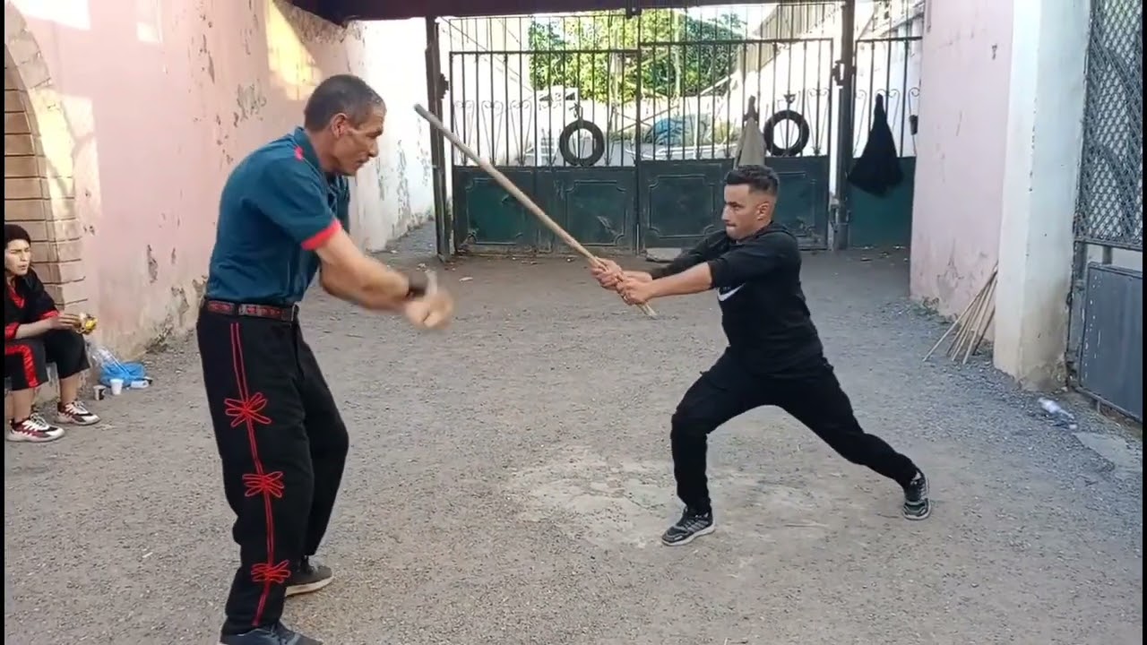 العصا التقليدية مع الشيخ بودينار اللعب بالوقاف Algérien Traditionnelle Combat Stick Oran