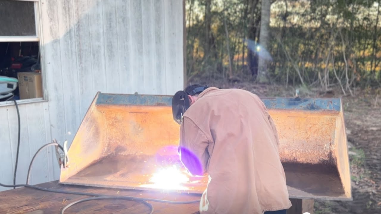 Welding up my skid steer bucket!