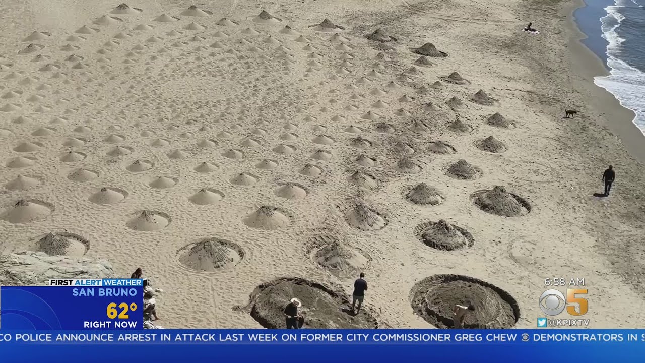 Tides of life; artist Jim Denevan uses the sands of San Francisco's Ocean Beach as  a canvas