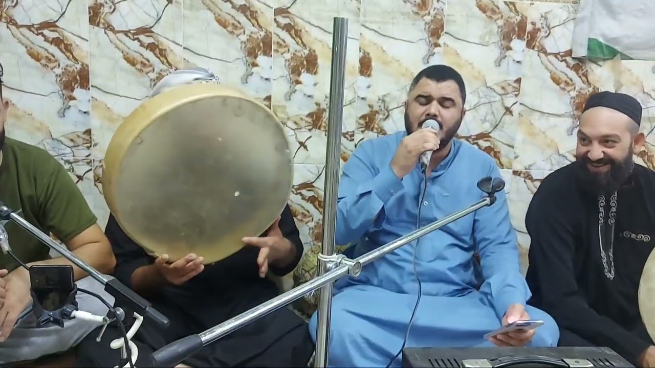 المداح خالد الحدادي  ويوسف الشاماني ومحمد الجبوري وامجد العزاوي  وعبد الودود