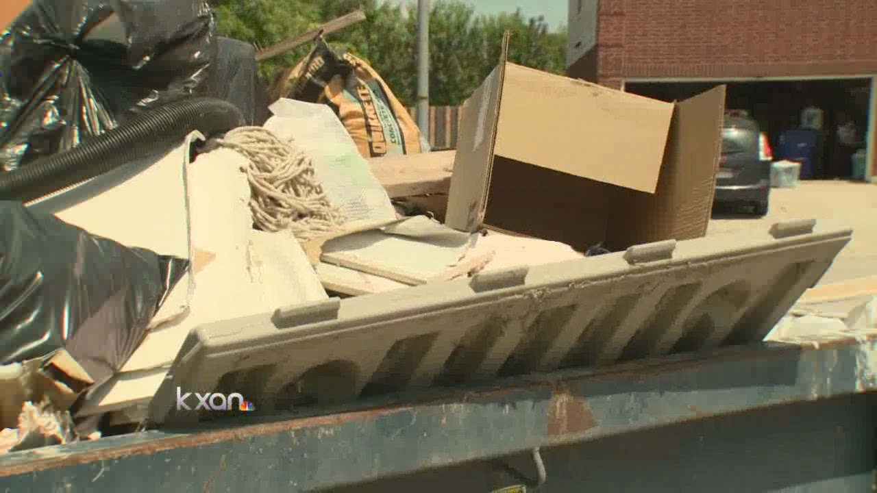 Homeowner told flood debris violates HOA rules