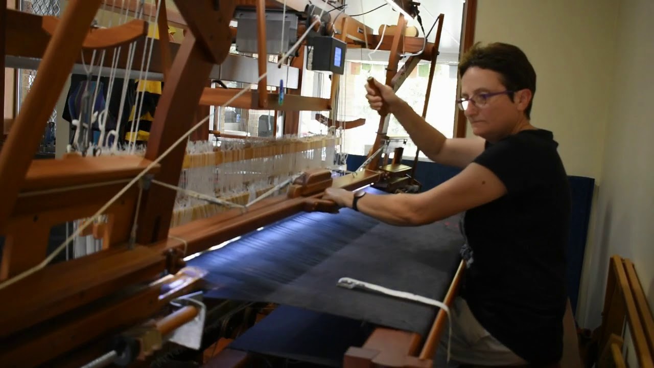 Weaving with fly shuttle