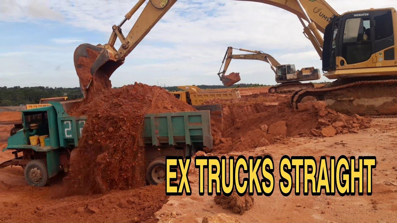 Excavator Komatsu.Hino king trucks.test strength.Dump truck