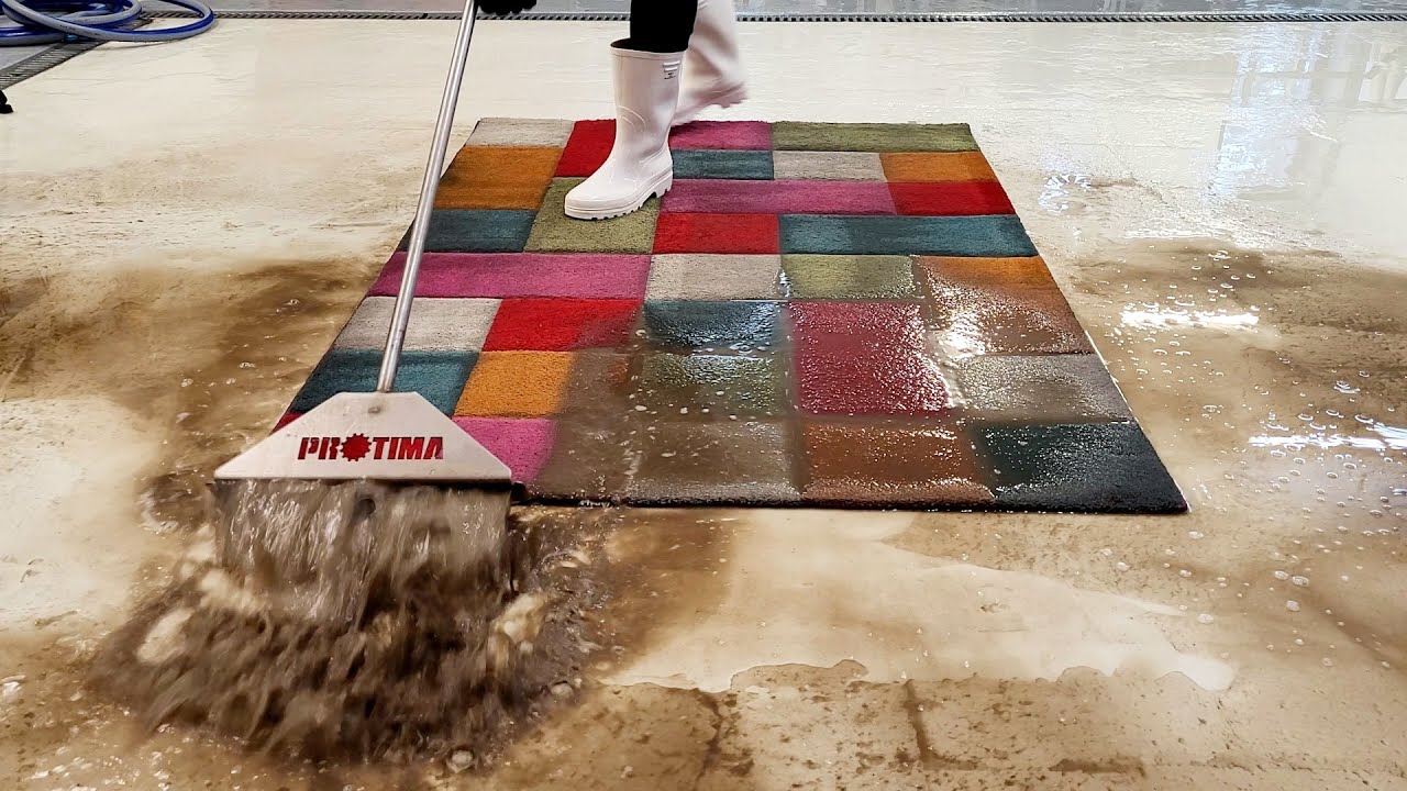 A colors explosion of a rubik's cube-style rug Speeded Up | power washing | satisfying asmr
