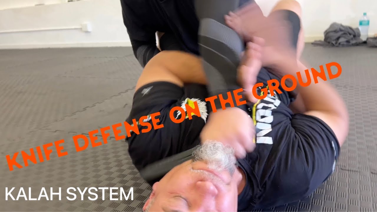 Knife defense on the ground