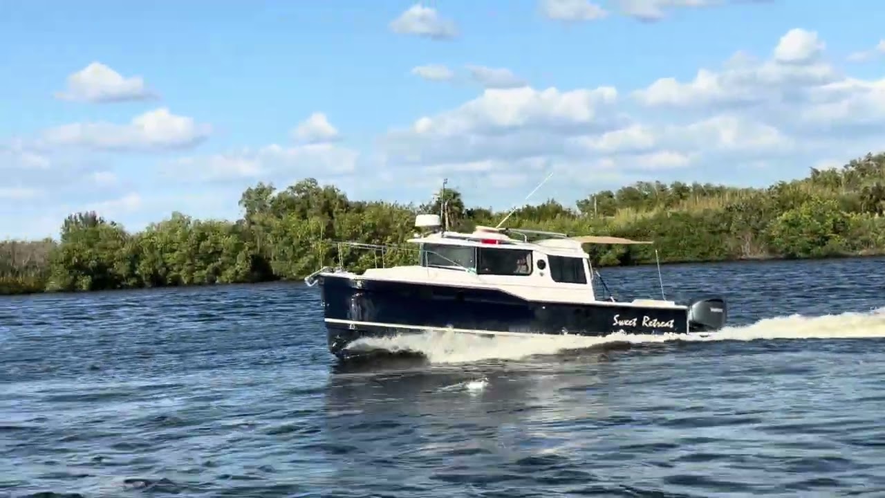 FOR SALE: 2022 Ranger Tug R-27 with only 106 hours! Offered by Grand Slam Yacht Sales. Ft Myers FL