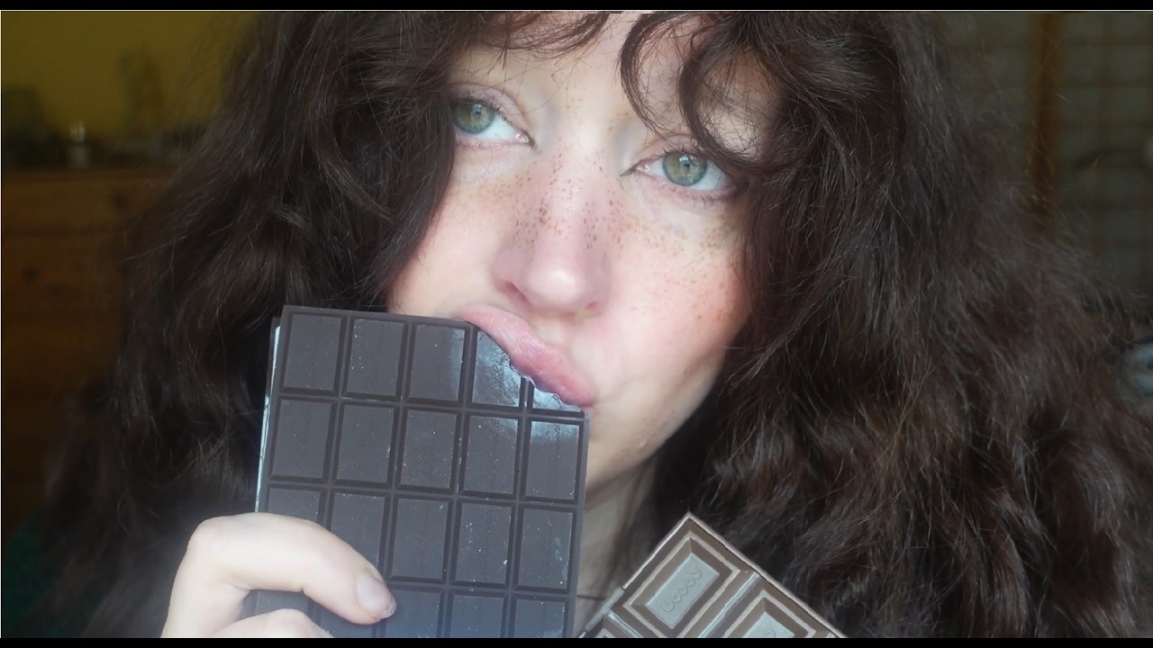 eating fake chocolate ASMR (whispers, mouth sounds, nibbling, biting)