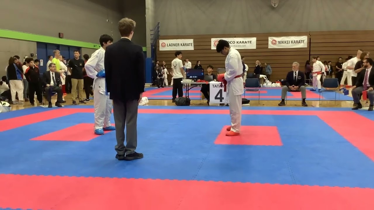 Brigitte Newell watches son, Jean, ref at Sato Cup Karate, 2025 #1