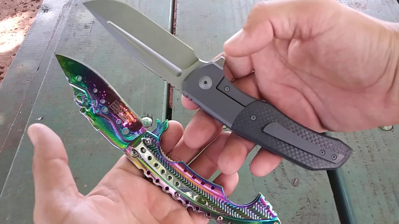 Two awesome new knives!  A Mermaid and an Iron Wolf.