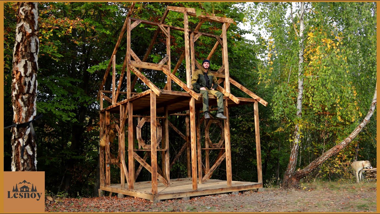 Construction of a two-story house from a tree.  DIY