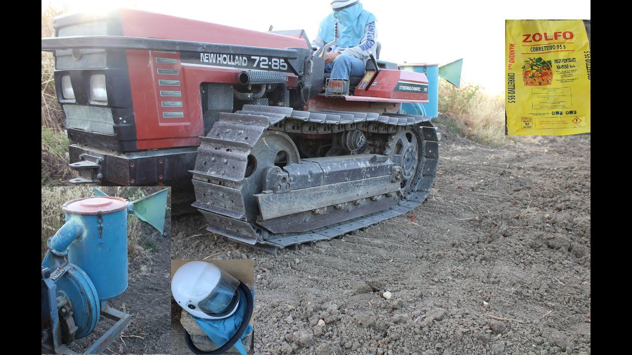 Zolfo - trattamento nel vigneto - trattore cingolato FiatAgri 72-82 con solfaratrice / impolveratore
