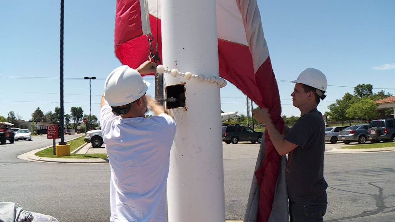 Lowering a Large Flag on a Steel Crank Flagpole