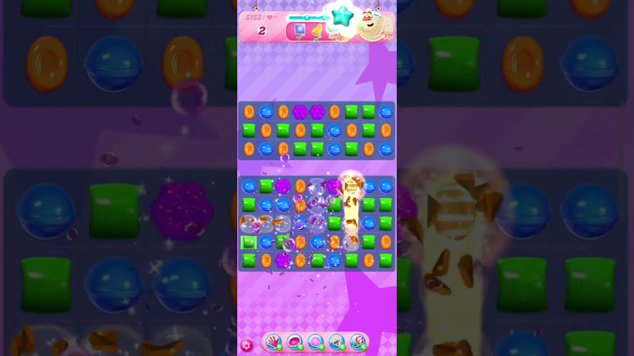 Jogando candy crush saga 