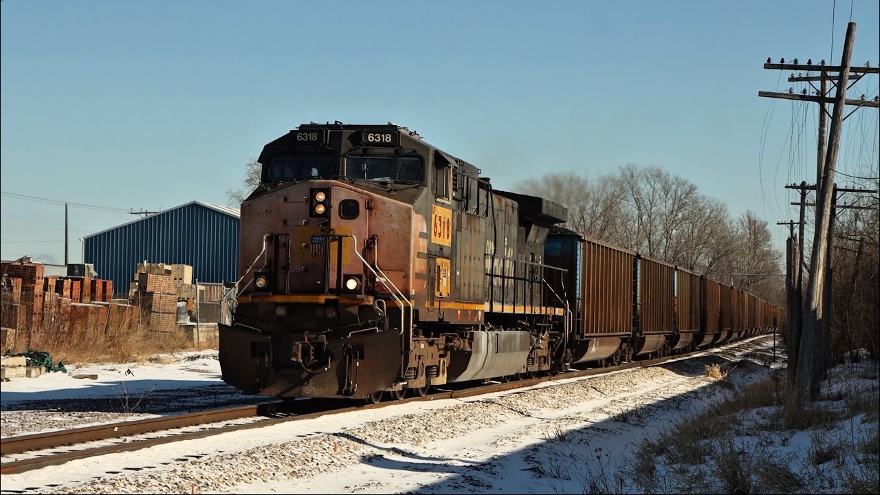 UP 6318 (SP patched) leads Sheboygan coal loads at St Francis WI