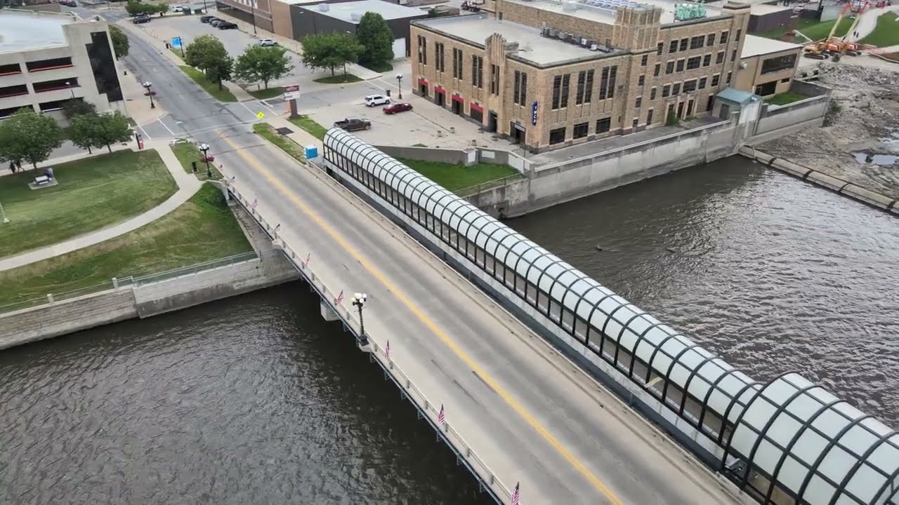 4K drone footage of Downtown Waterloo Iowa, Cedar river, bridges, Waterloo Center for the Arts