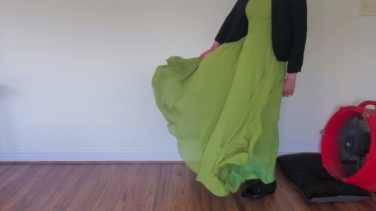 Long Green Dress Blown by Big Fan