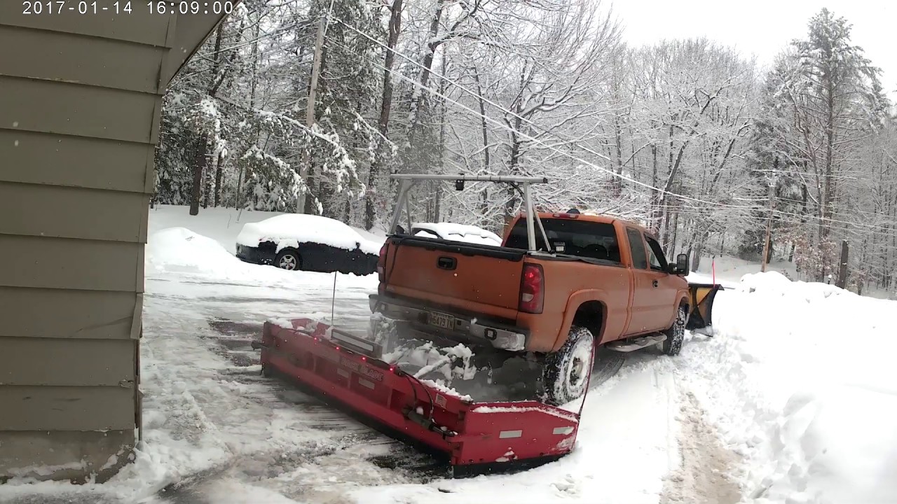 Snow plowing with a back blade