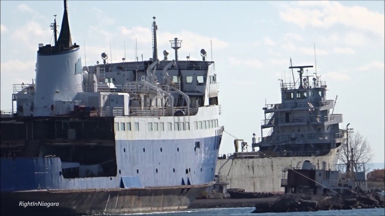 Ship ALGOMA DISCOVERY passes scrap ferry PRINCESS OF ACADIA, Welland Canal, 2017