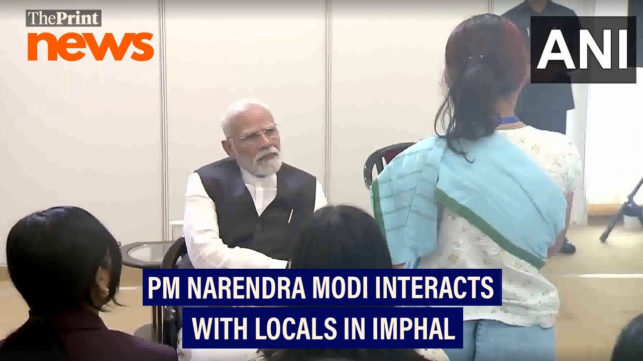 PM Narendra Modi interacts with local residents during his visit to Imphal
