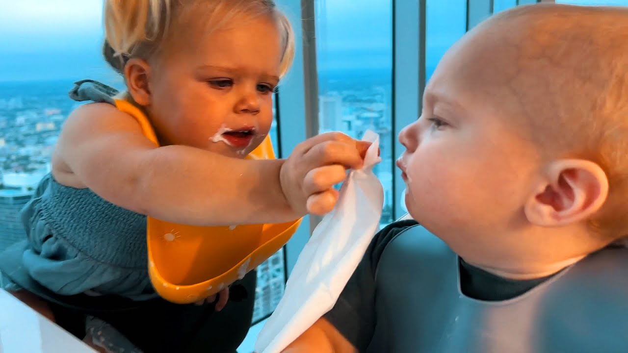 How older toddler takes care of her younger brother