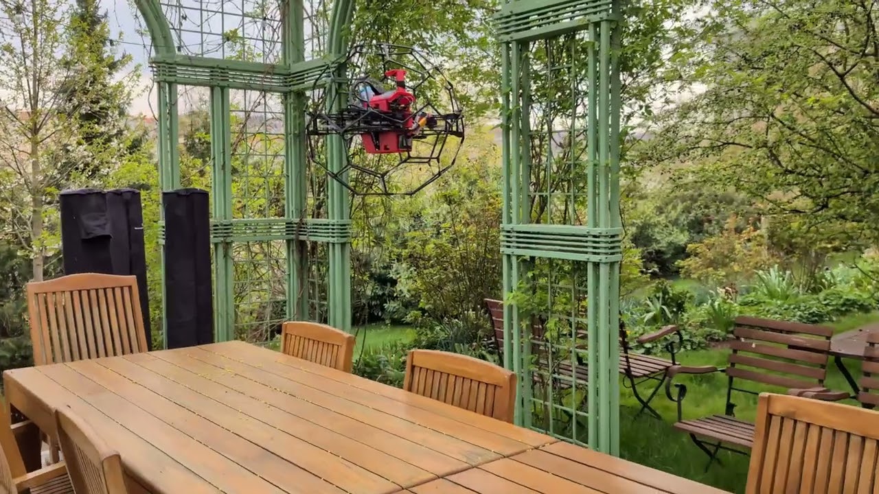 Drone + football-shaped cage = fly anywhere, hit anything