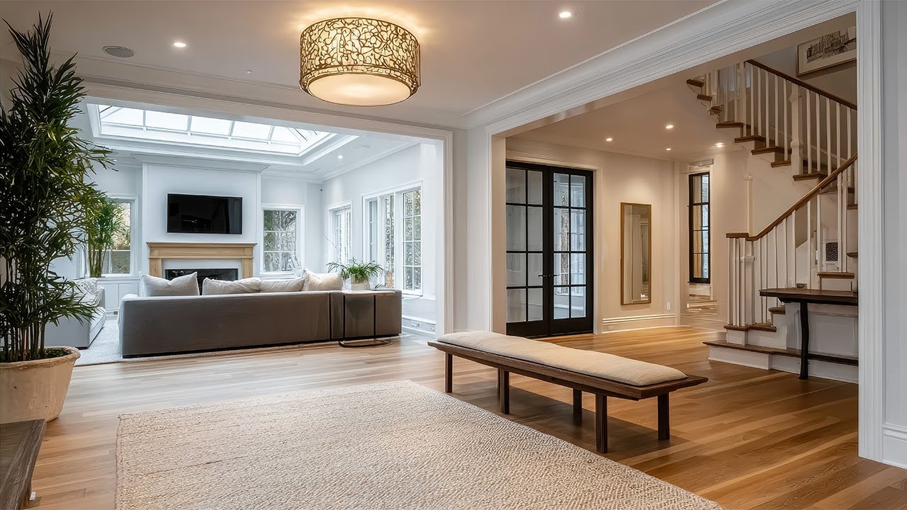 Cohesive Interior Design: Mixing Furniture from Foyer to Family Room