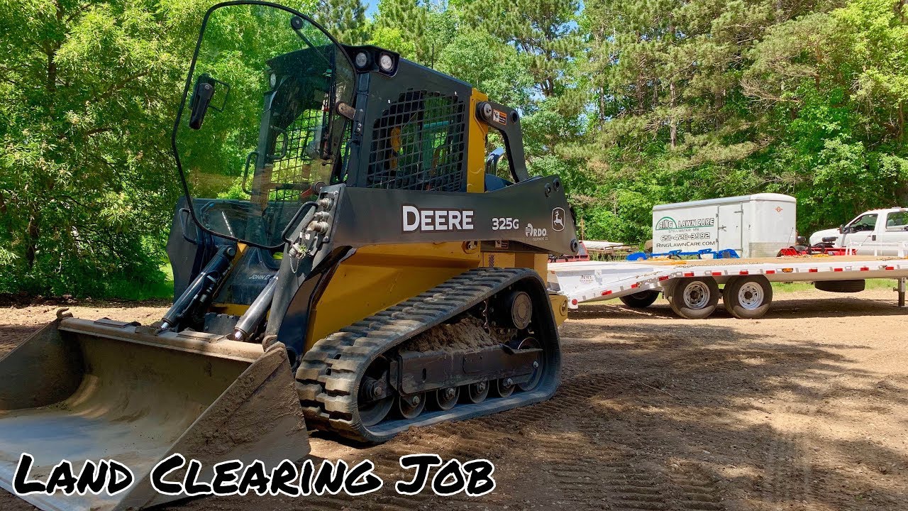 John Deere 325G Расчистка земли с помощью грейфера