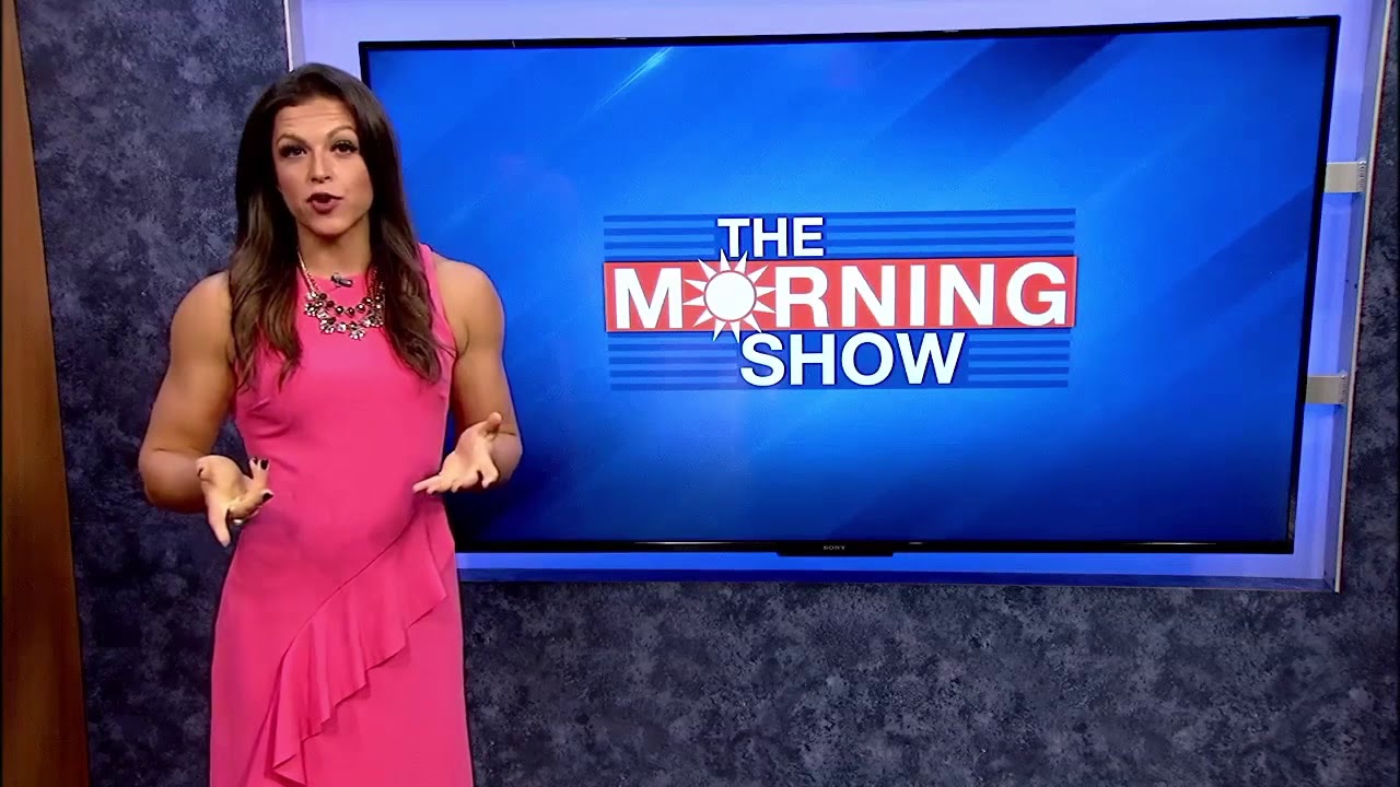 Strong muscle woman with big arms, buff tv anchor