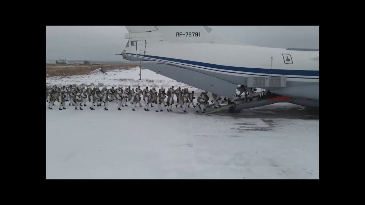 Russian Il-76 dropping paratroops with tanks