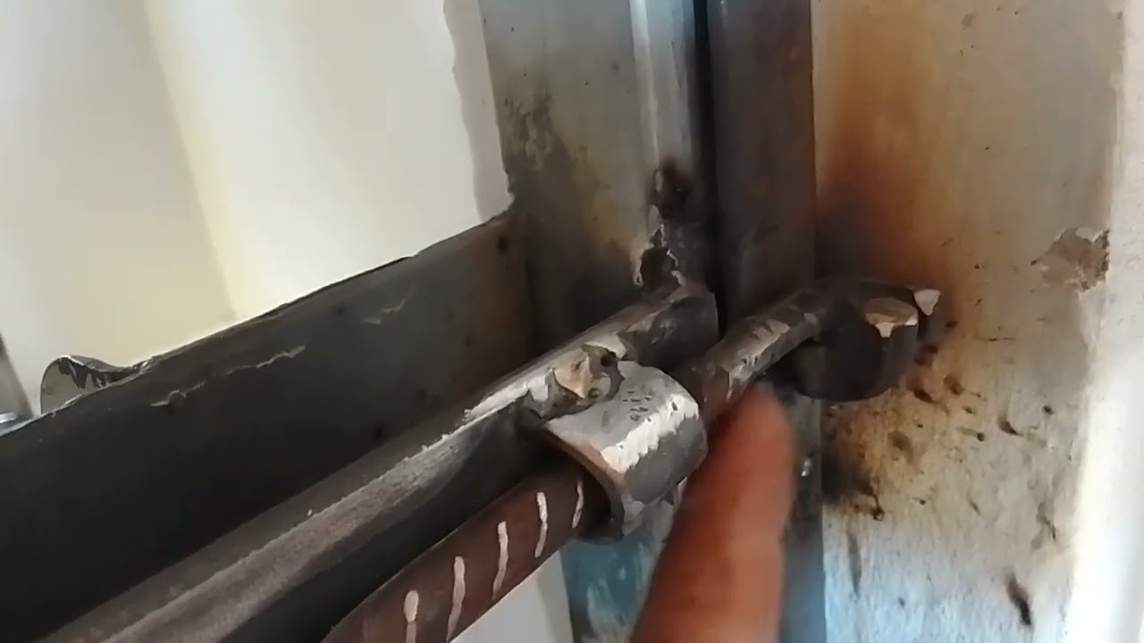 como fazer um ferrolho de vergalhão de concreto para colocar na porta