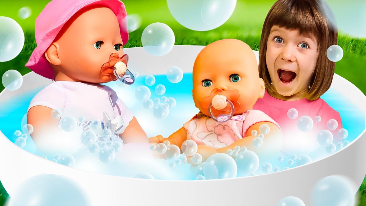 The baby doll is crying! Bianca and her little brother go swimming in a jacuzzi. Family fun for kids