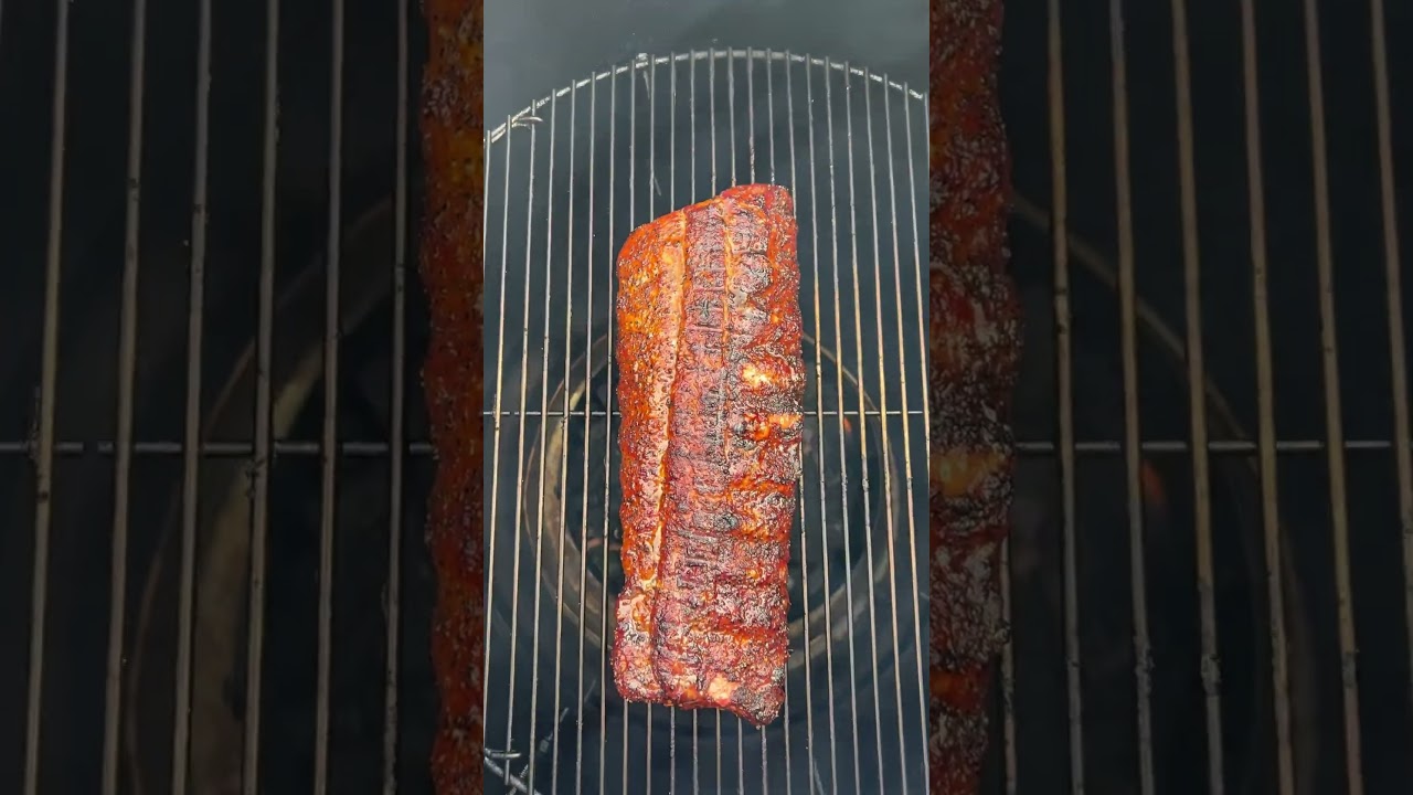 Burn and turn baby backs over direct heat on the Ugly Drum Smoker. 
